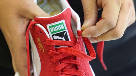 La familia Pinault evalúa una posible venta de Puma